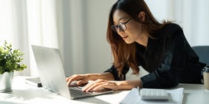 Woman on Computer at Desk